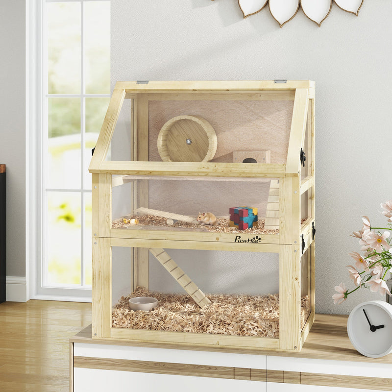 Natural wood hamster cage displayed on a white cabinet with flowers and a clock
