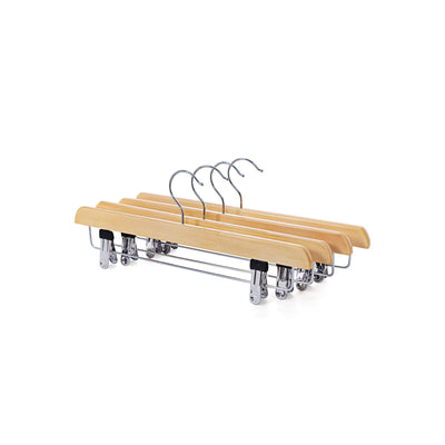 Row of natural wooden trouser hangers fanned out to show the chrome clip bars