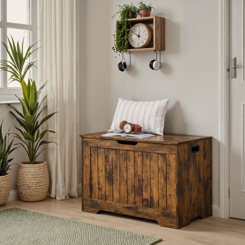 Rustic brown wooden storage bench in a hallway beneath a wall clock shelf