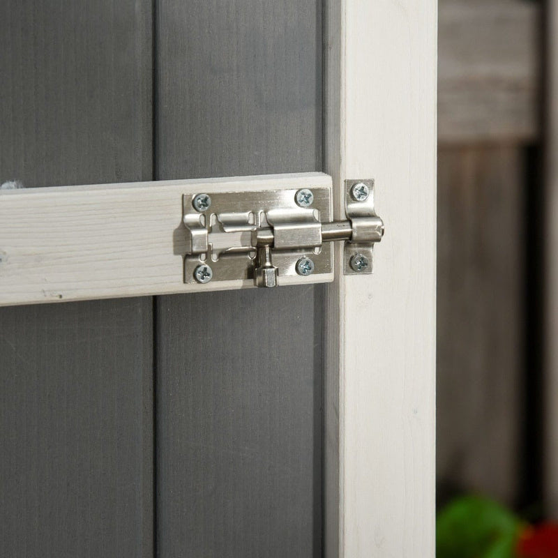 Close-up of the metal bolt latch on the grey shed door