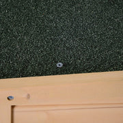 Close-up of the black asphalt felt covering the shed roof
