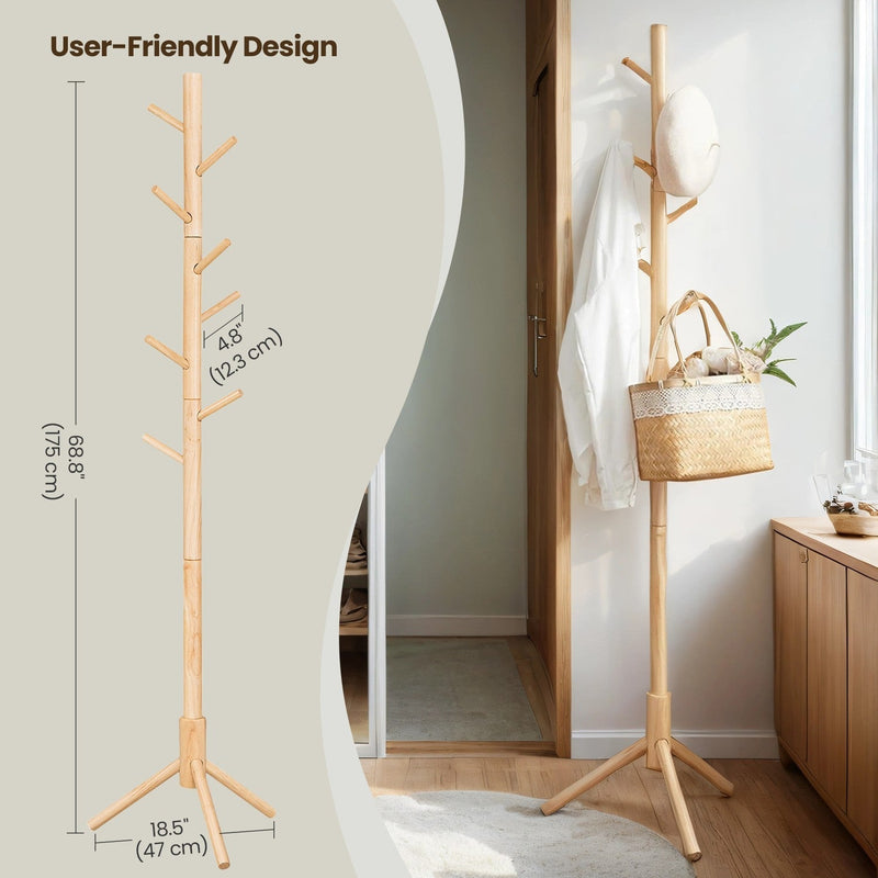 Wooden tree coat rack positioned in a bedroom setting