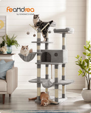 Light grey 164 cm cat tree in a living room with two cats on the perches and a dog below