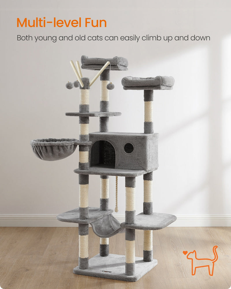 Full view of the light grey cat tree showing the levels cats climb between