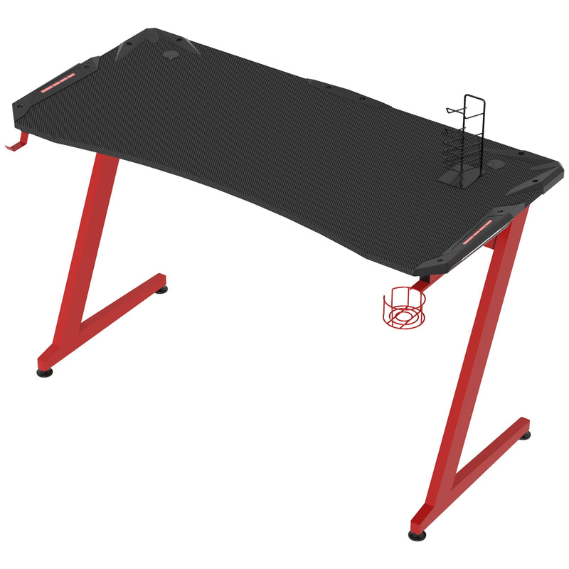 142 cm Z-shaped gaming desk from a raised angle with gamepad holder and cup holder