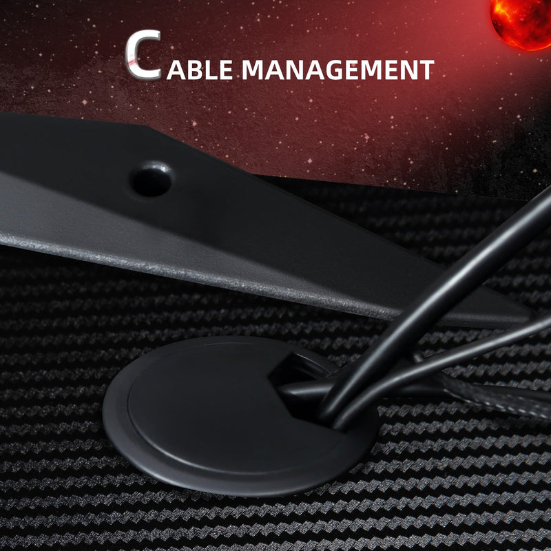 Close-up of the cable management hole with cables passing through the tabletop