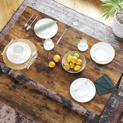 Industrial Style Dining Table by Vasagle (120x75x75cm) - Features a black steel frame and rustic brown wooden top