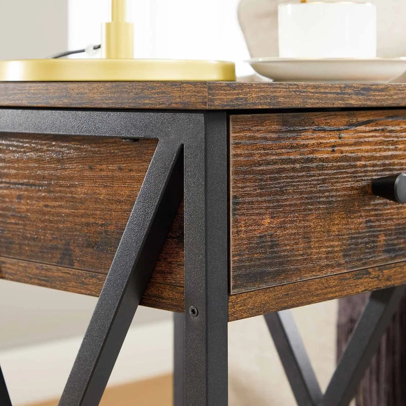 Industrial Nightstand With Drawer by Vasagle - Stylish bedside table with a black steel frame and rustic brown wooden body and draw. There is an open shelf at the bottom
