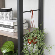 4 Tier Industrial Bookcase by Vasagle - black steel frame with rustic brown wooden shelves - staggered layout provides stylish touch to your living room