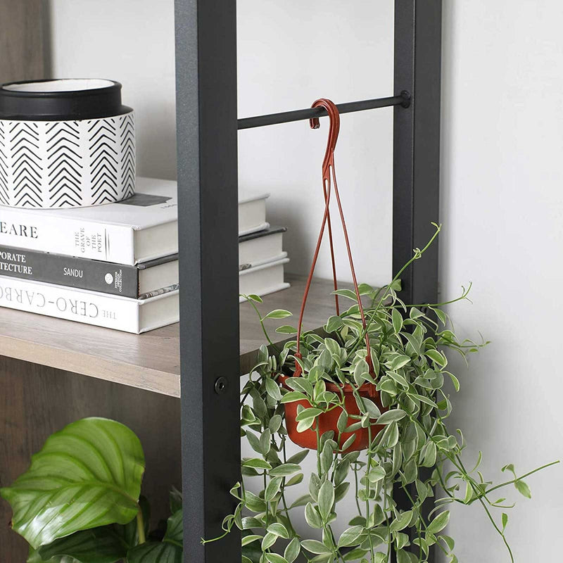 4 Tier Industrial Bookcase by Vasagle - black steel frame with rustic brown wooden shelves - staggered layout provides stylish touch to your living room