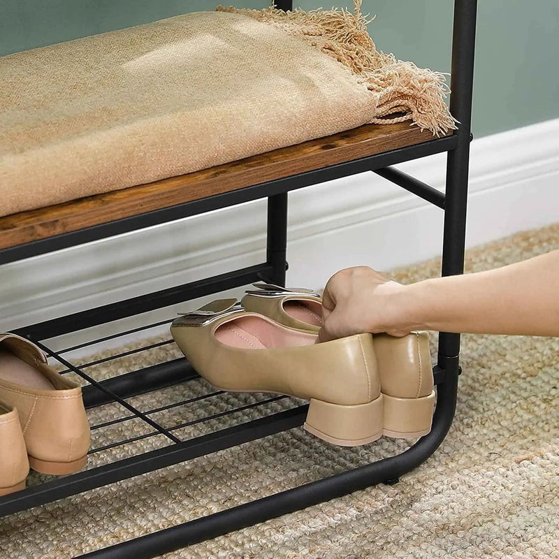 Styish Entryway Coat and Shoe Rack by Vasagle - black steel frame and rustic brown wooden seat and shelf plus one wire shelf for storing shoes. Also includes hooks on the side for hanging bags and umbrellas