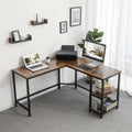 L Shaped Desk With Shelves For Home Office by Vasagle - Features a black steel frame with greige desktop, and two shelves underneath to the right