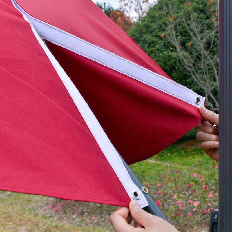 Image of a red cantilever parasol with solar lights