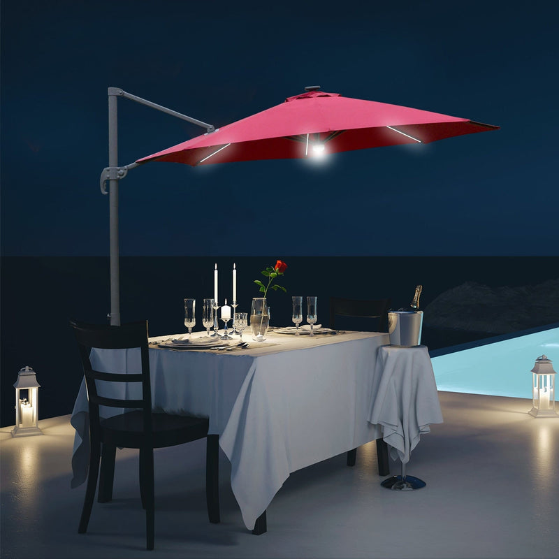 Image of a red cantilever parasol with solar lights