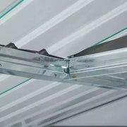 Close-up of the underside of the apex roof panels and the steel ridge beam