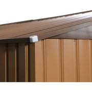 Close-up of the wood-effect roof edge overhanging the ribbed steel wall panels