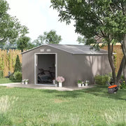 Light grey metal garden shed on a lawn with the sliding doors open and a mower outside